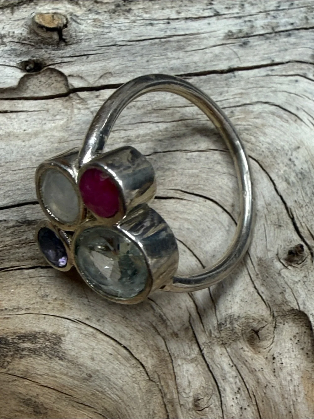 Sterling Silver ring with bezeled iolite, moonstone, ruby and aquamarine. New!